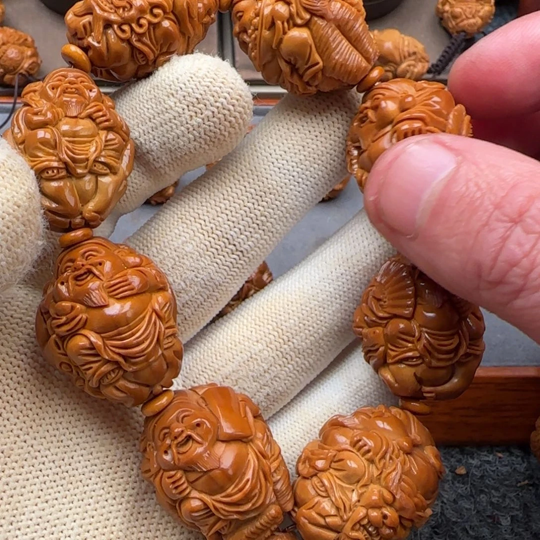 橄榄核吊坠瑞兽八方来财