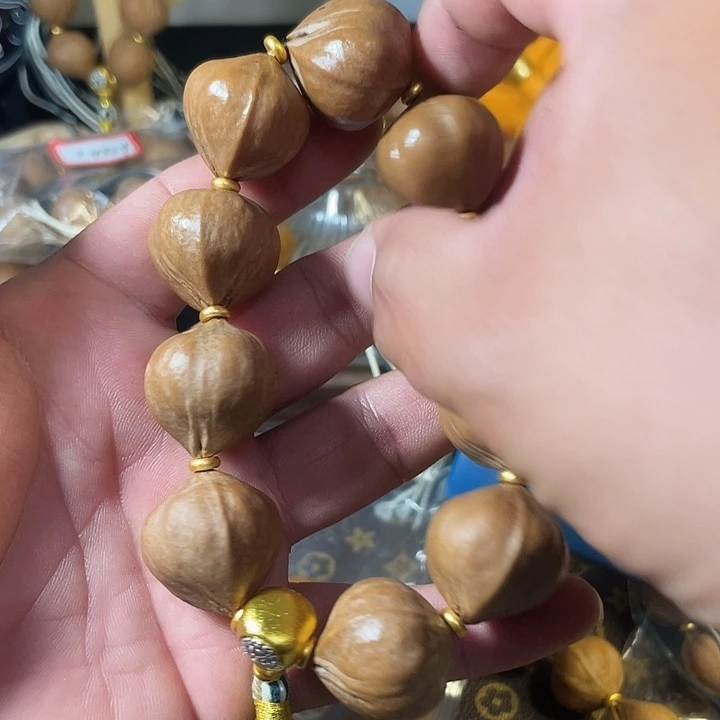 用***3手串橄榄核梅林铁