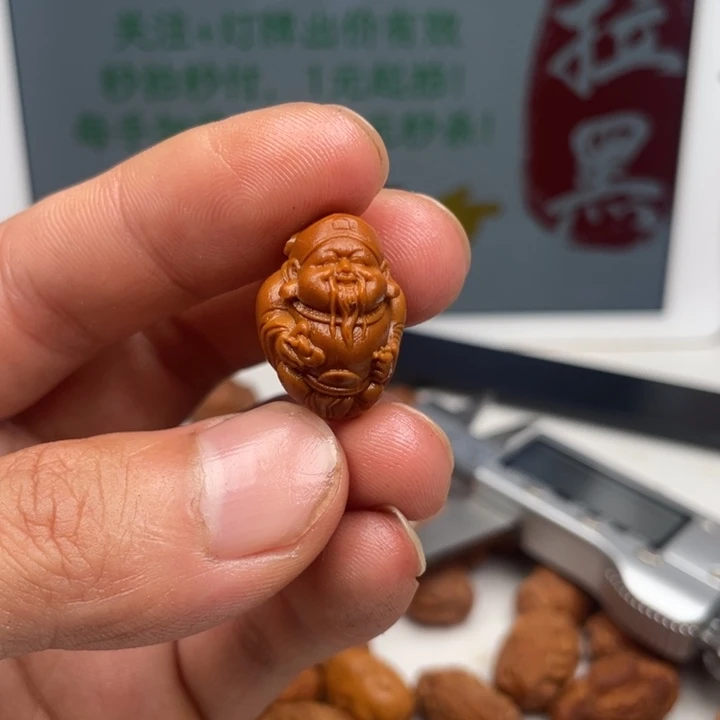 橄榄核吊坠橄榄核雕刻单子。