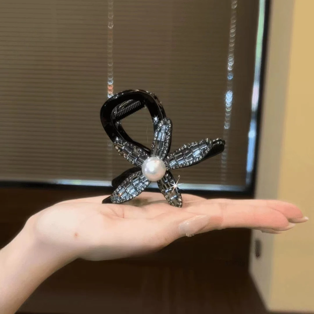 M2093夏季2025新款黑色太阳花中号8厘米抓夹发夹