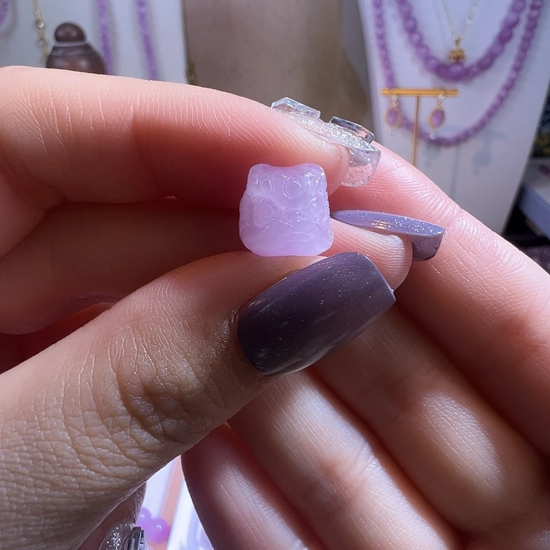 锂辉石未镶嵌单珠紫锂辉雕刻件醒狮头