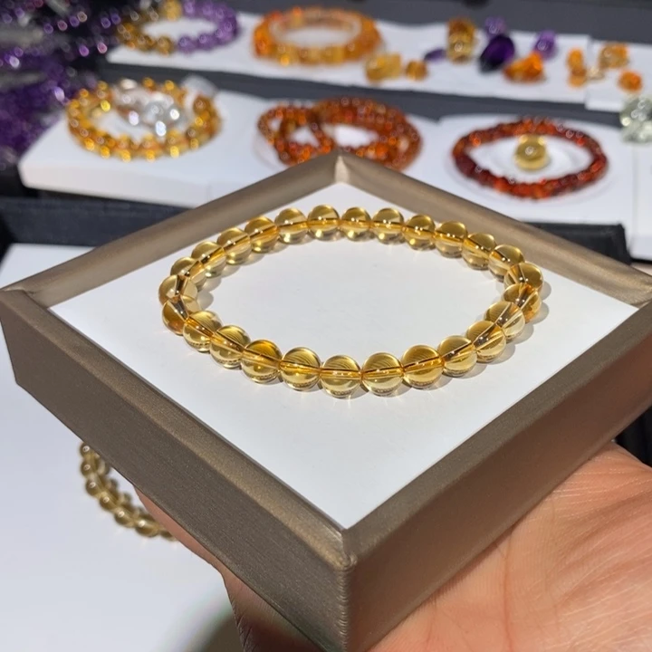 玲***水晶手链未镶嵌8mm天然巴西黄水晶手链