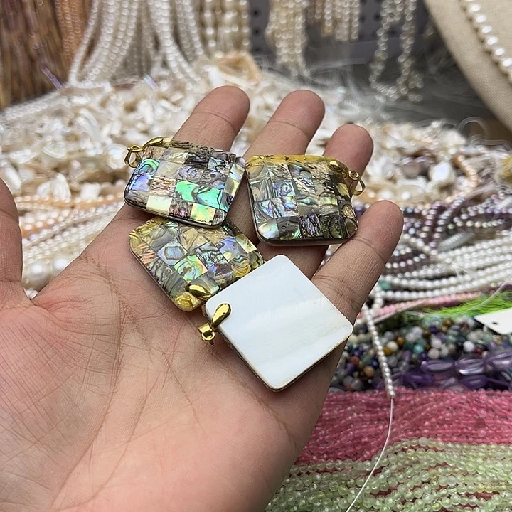 玛瑙/玉髓未镶嵌珠宝半成品一个鲍鱼贝吊坠
