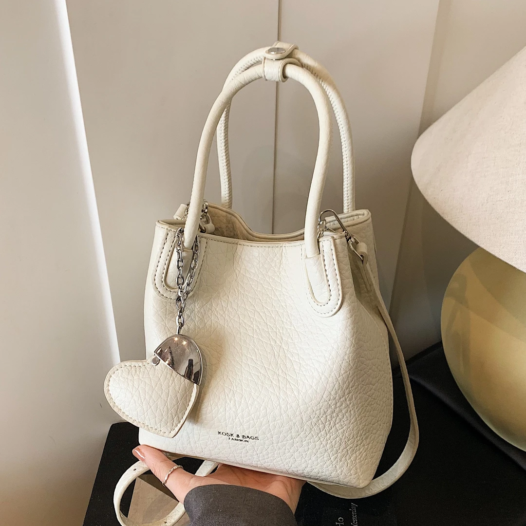 韩系小众菜篮子水桶包2025春季新款托特包通勤单肩斜挎手提小包包