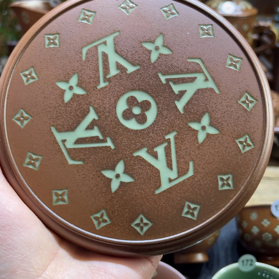 文***姆草木灰老花壶承填釉