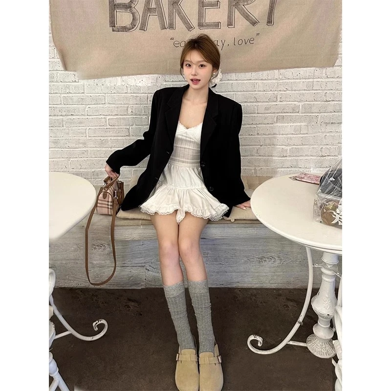 黑色小西装辣妹2025秋季新款高级设计感纯欲韩版小众宽松垫肩西服