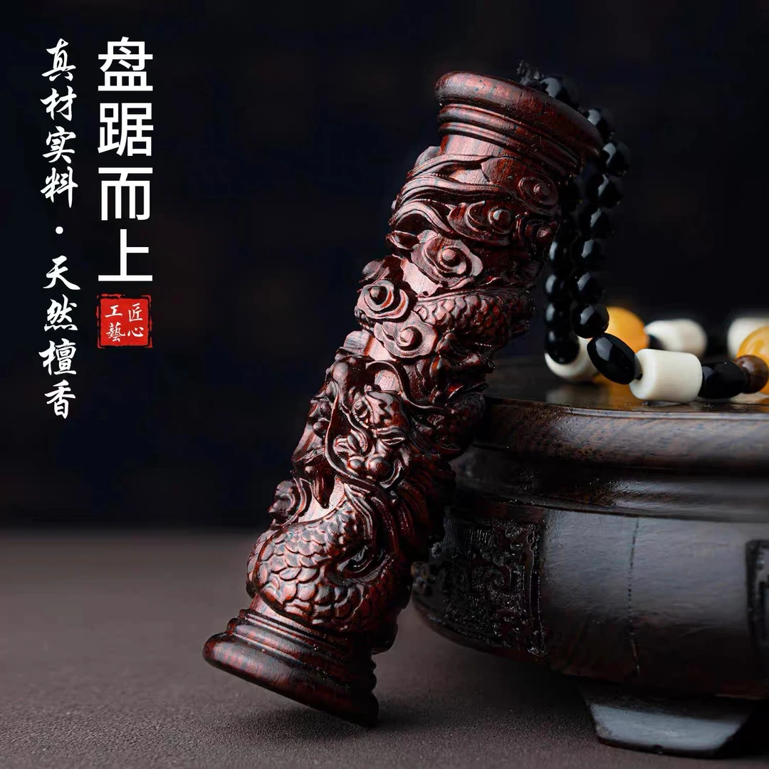 A144紫檀盘龙柱手把件