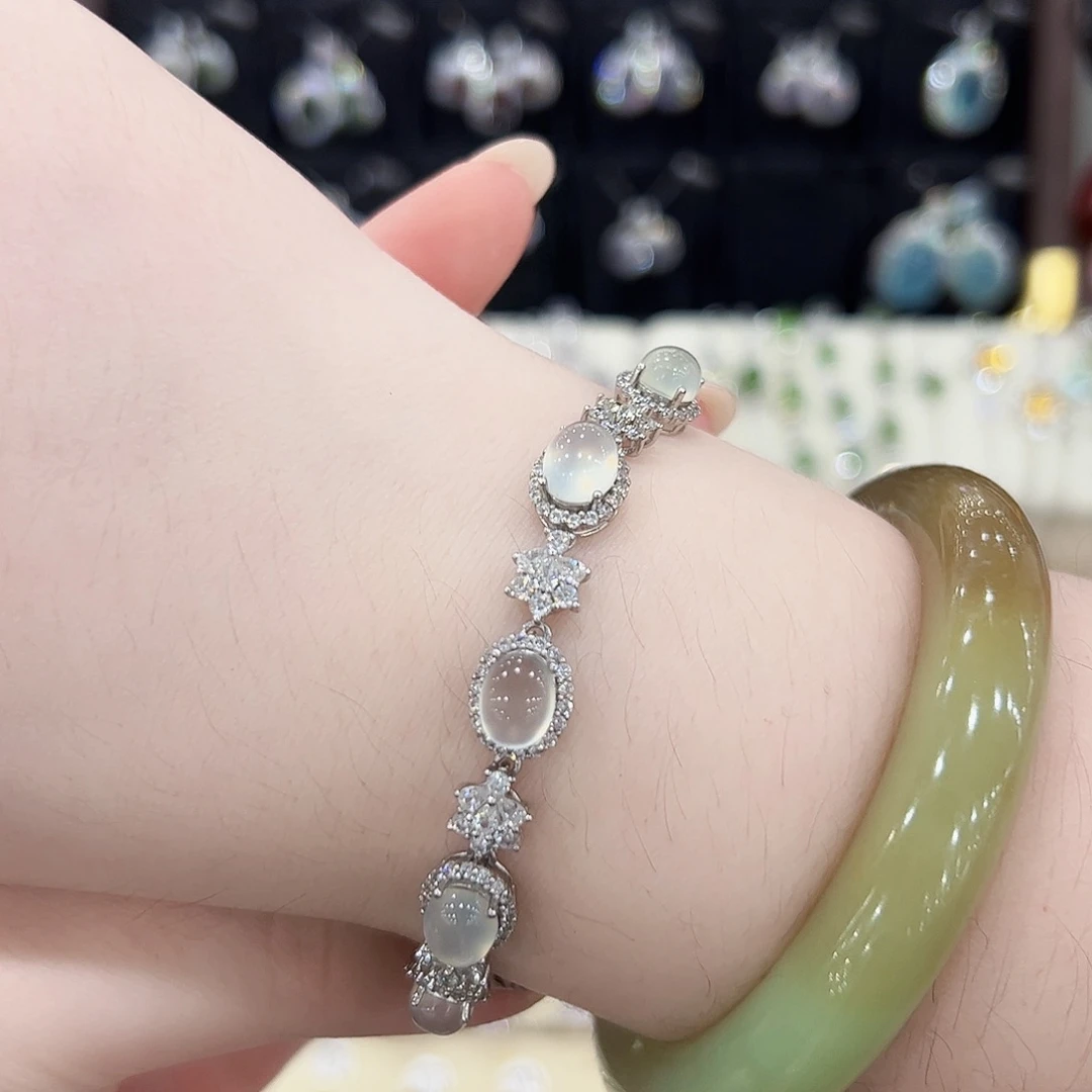 卉***会银S925镶嵌蛇纹石玉戒指