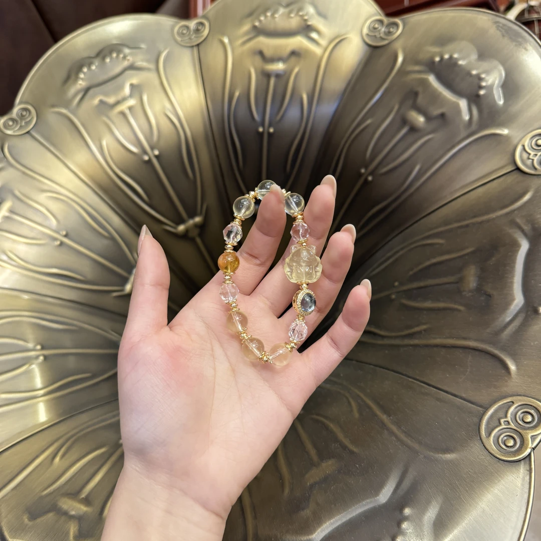 YYSZ52*凤九黄水手串