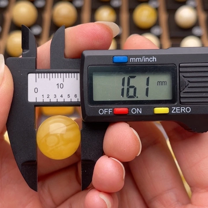 裸石琥珀未镶嵌优****?蜜蜡圆珠鸽