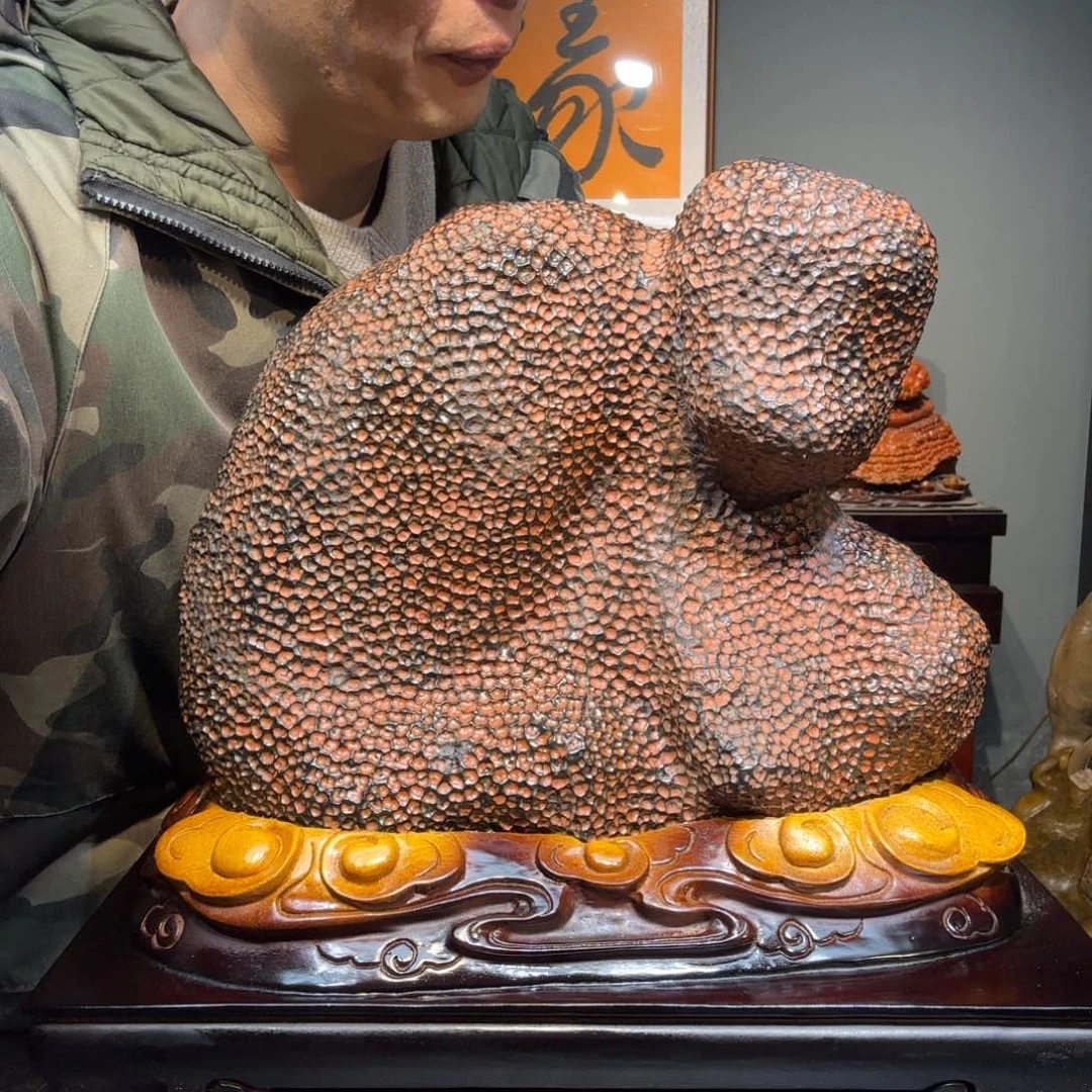 用***潘蜂窝石奇石摆件一个