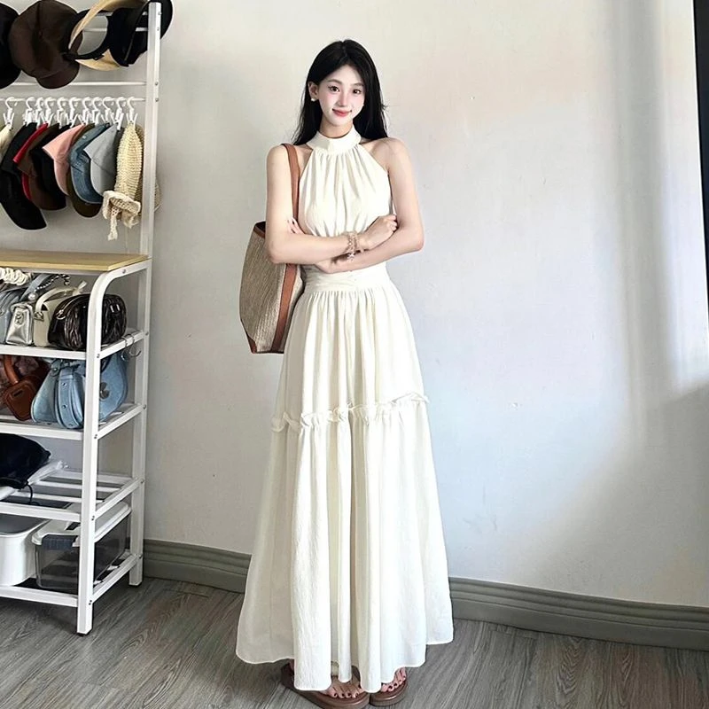 哥弟阿玛施正海边度假风白色无袖挂脖连衣裙女2025夏季设计感收