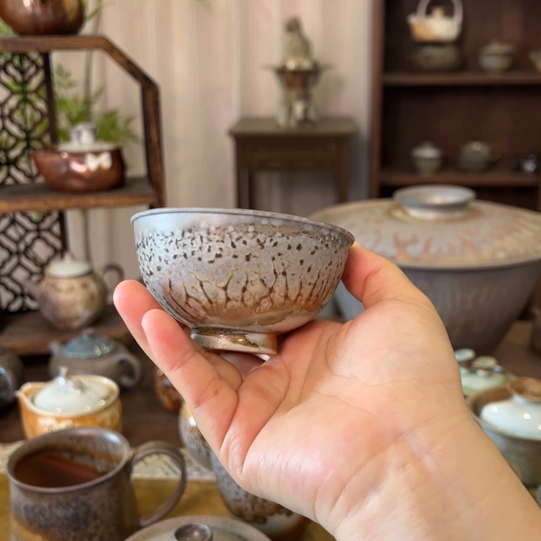09中白重落灰鸡心杯