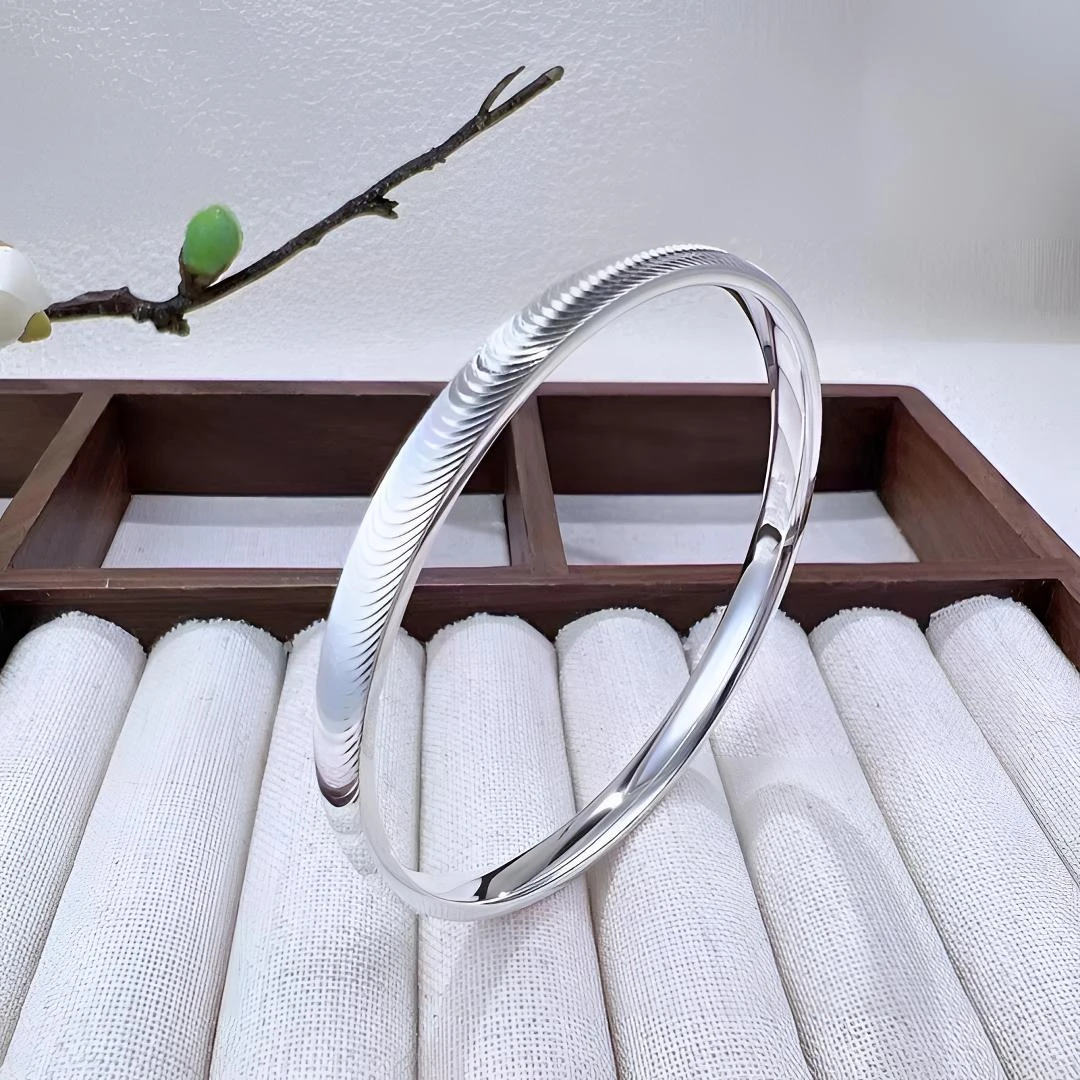 足银手镯 猫眼足银999.9手镯亮面实心气质轻奢高级过年送女友