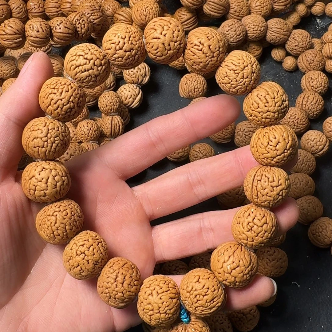 拼****吊坠桃核野生肌肉手持