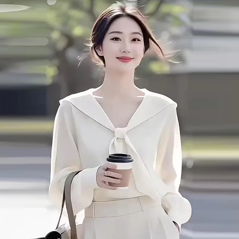 2025新款超好看独特漂亮气质上衣温柔风韩系白色v领针织衫女春