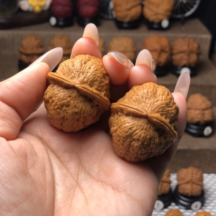 橄榄核吊坠30呱呱来财