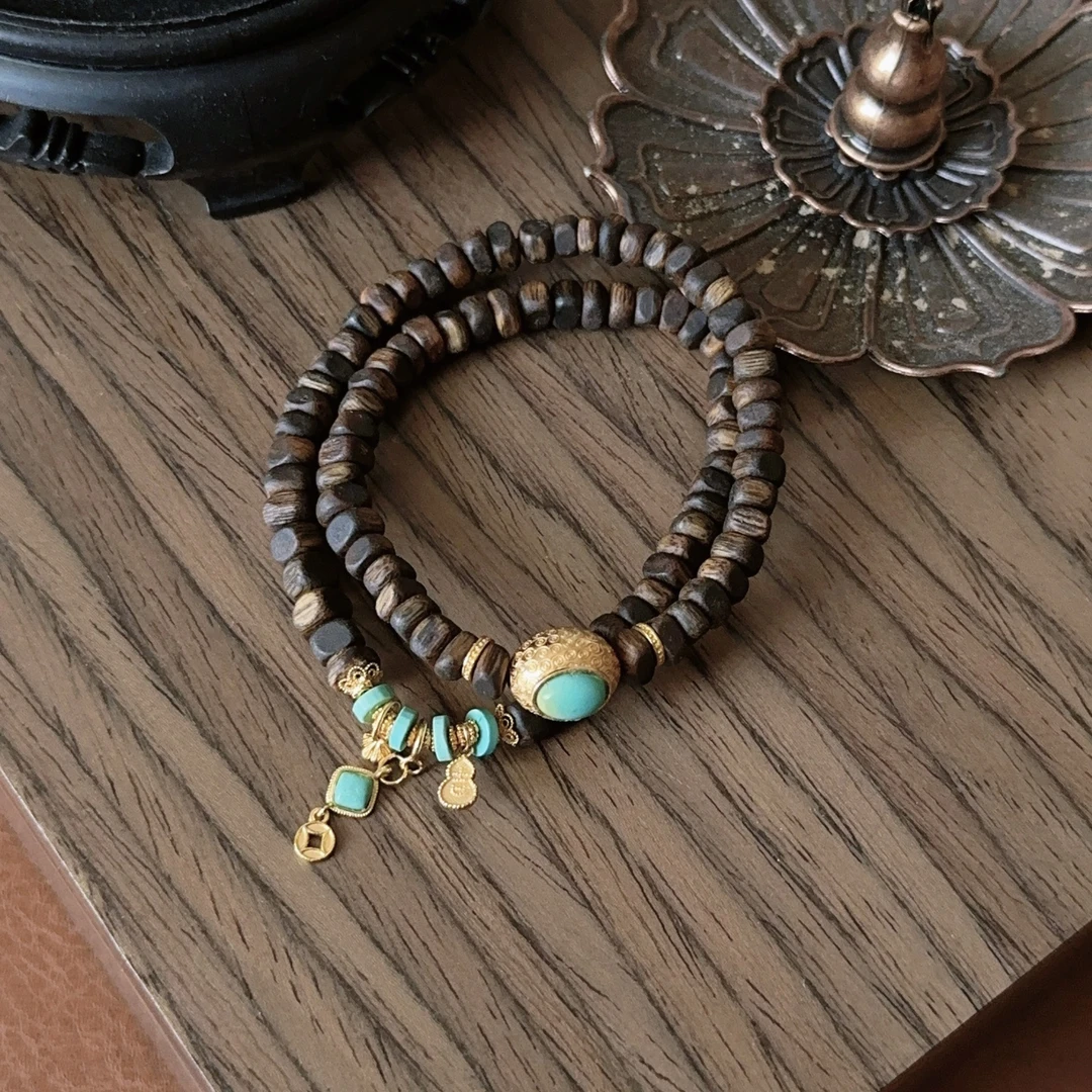 沉香奇楠沉香绿松双圈手串