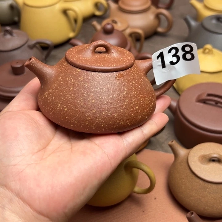 茶壶紫砂红降坡半手工210左右瑕疵