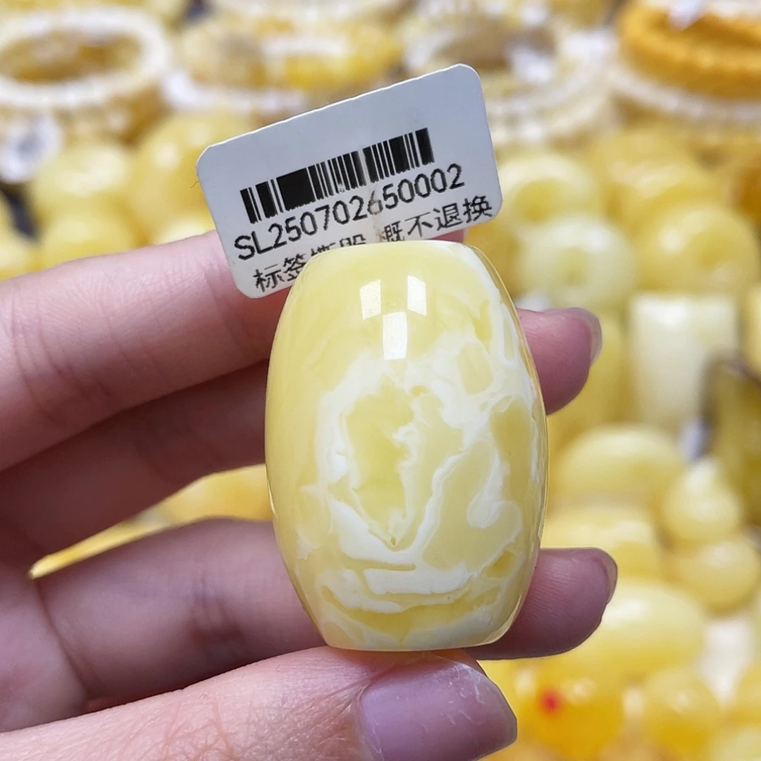 琥珀未镶嵌裸石24.1*33.4mm白妖花桶珠瑕