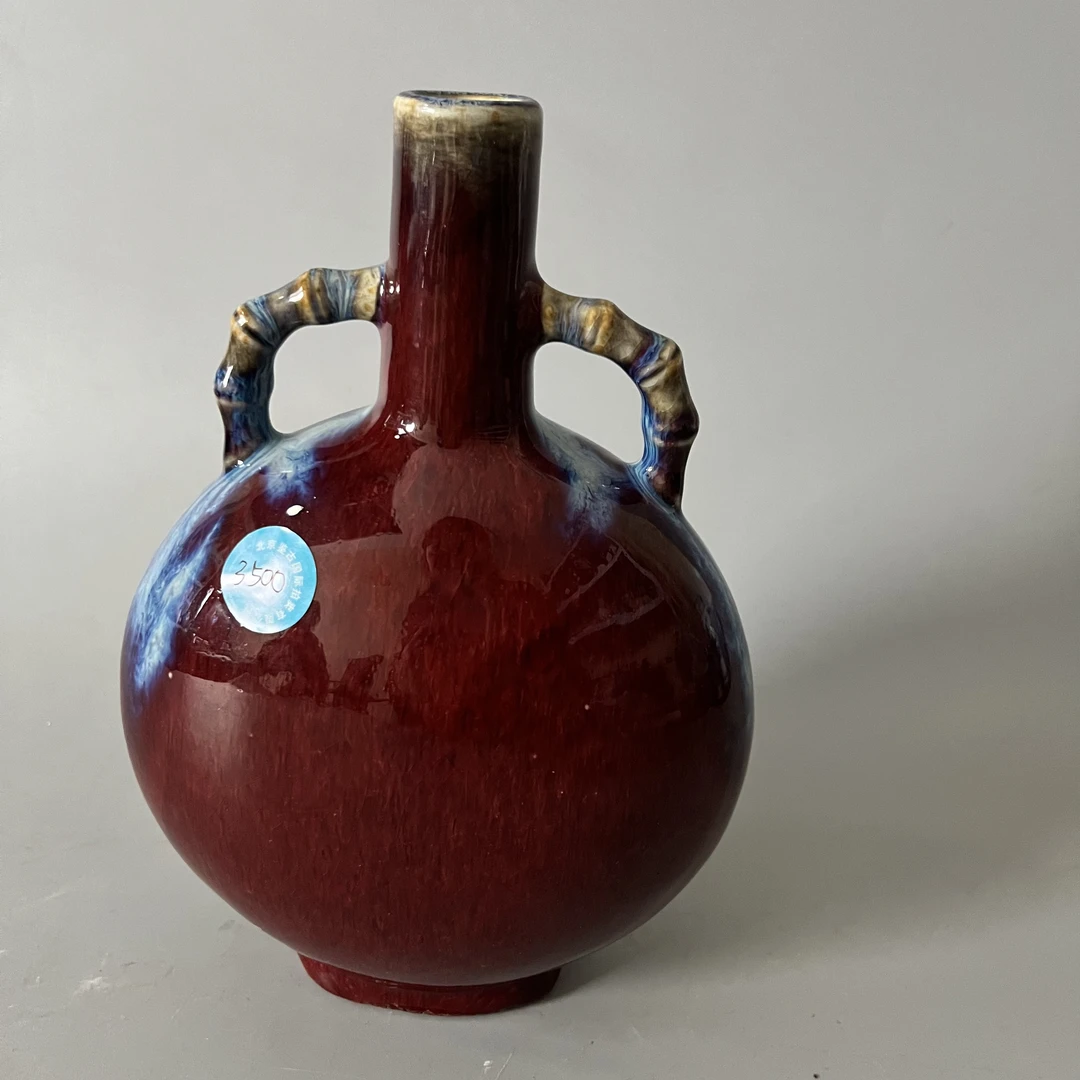 167 清雍正窑变釉抱月瓶