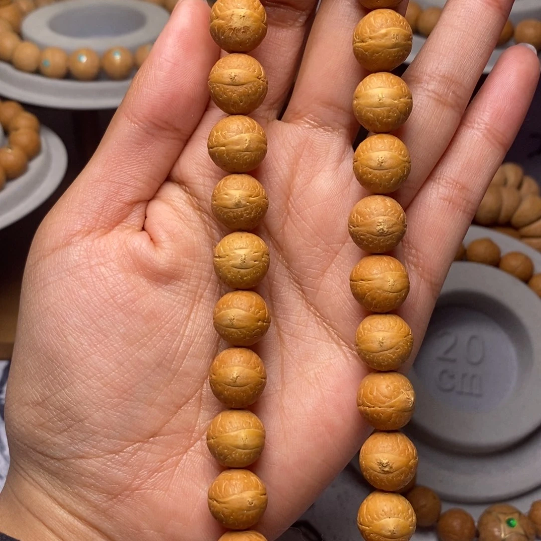 凤眼菩提吊坠手持