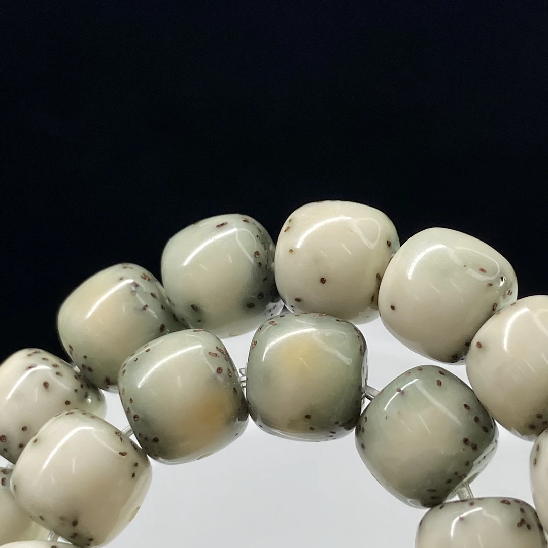 509686海南星月菩提火烧云石玉料大留白文玩手串