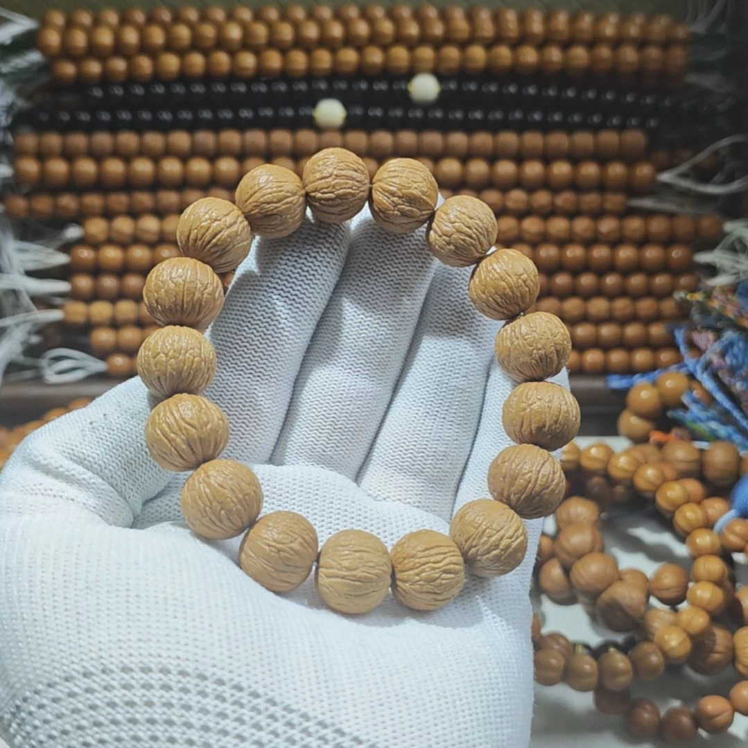 猴头核桃手串原皮原色凤羽打好底了15mm