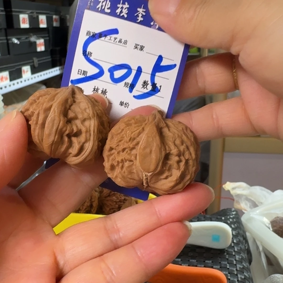 馒***爸把件文玩核桃白狮子异型