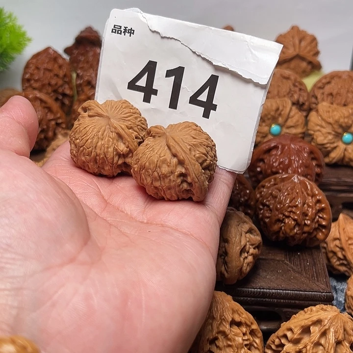 桃核把件龙珠。边35。  414