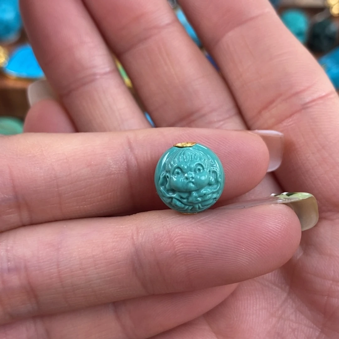 绿松石未镶嵌。黄财神