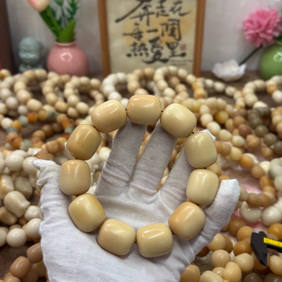 吊坠菩提根/象牙果24干磨瑕疵牙果年糕187