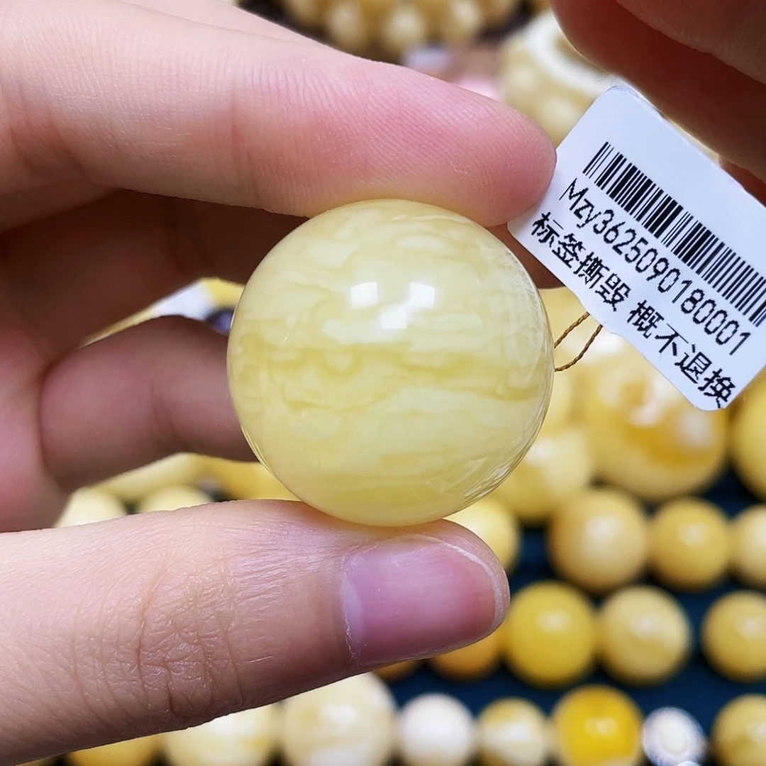琥珀未镶嵌裸石27.3mm.瑕