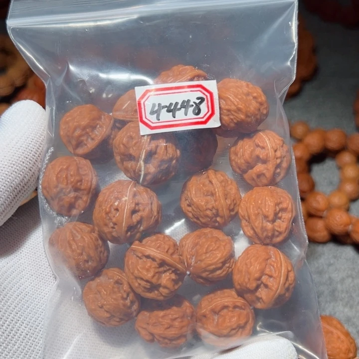 桃核手串烟****?4448异形钱袋核桃手持