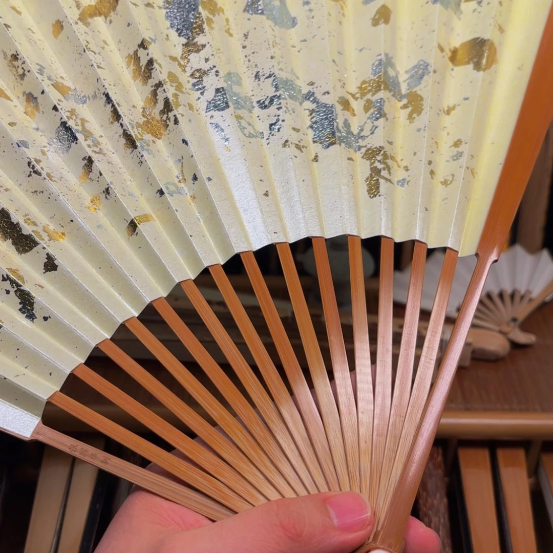 扇子全老和尚头白洒