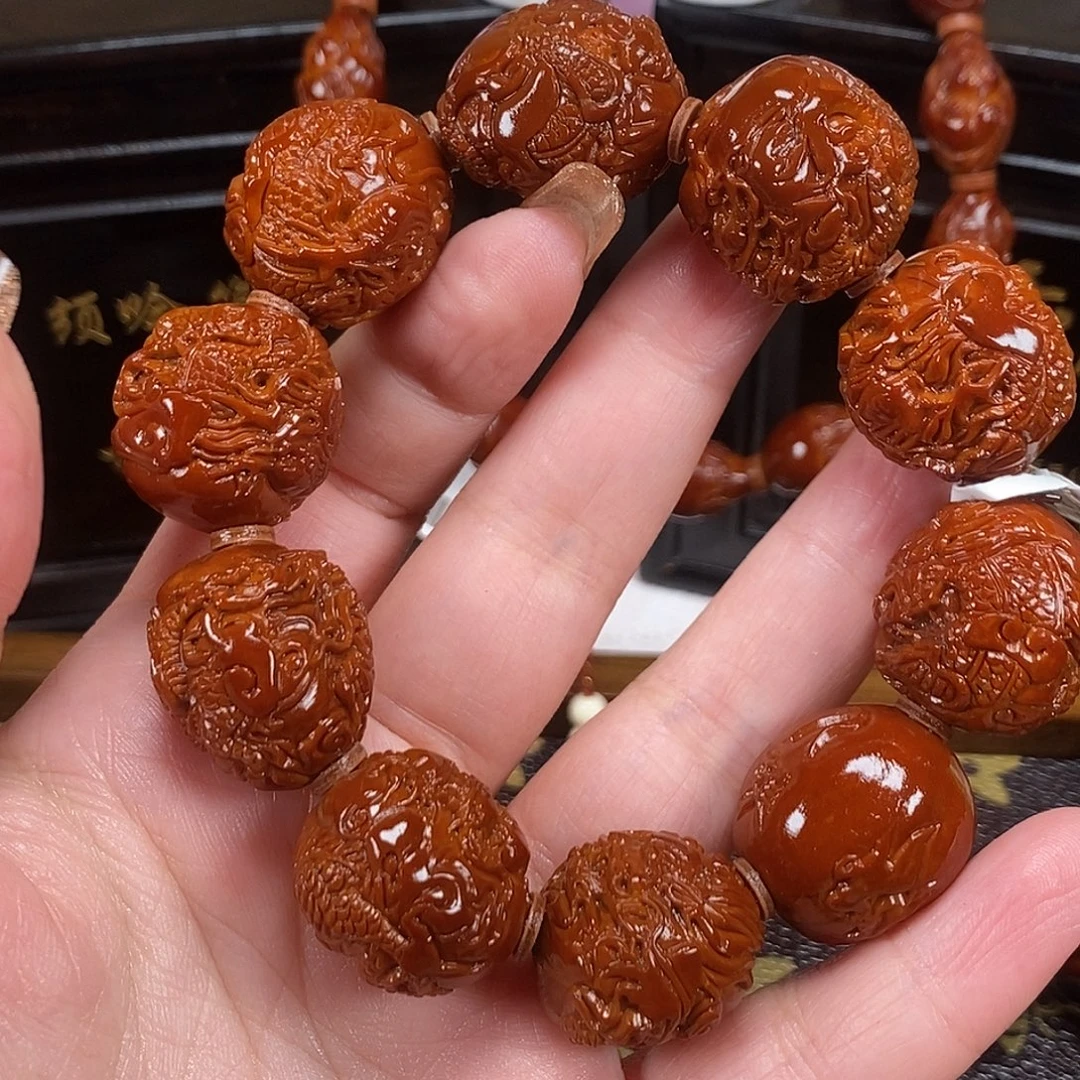 哥***白橄榄核吊坠九龙戏珠1111