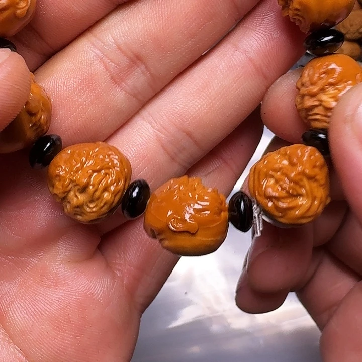 橄榄核手串你是谁