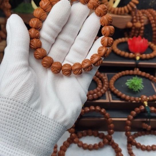 吊坠桃核岗**上13双脊龙手串