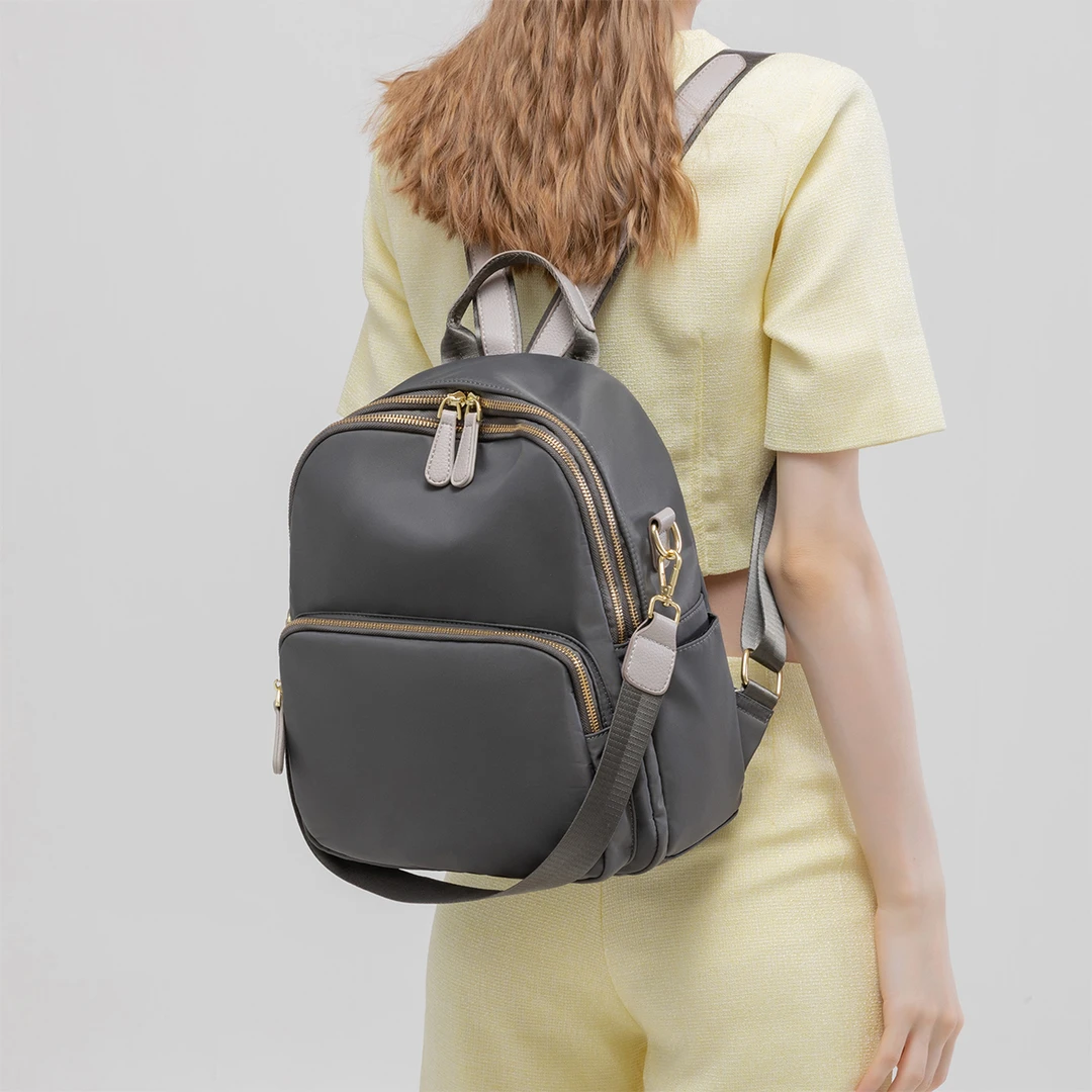 韩版女生通勤防水时尚小背包简约大容量双肩包女多层多功能单肩包