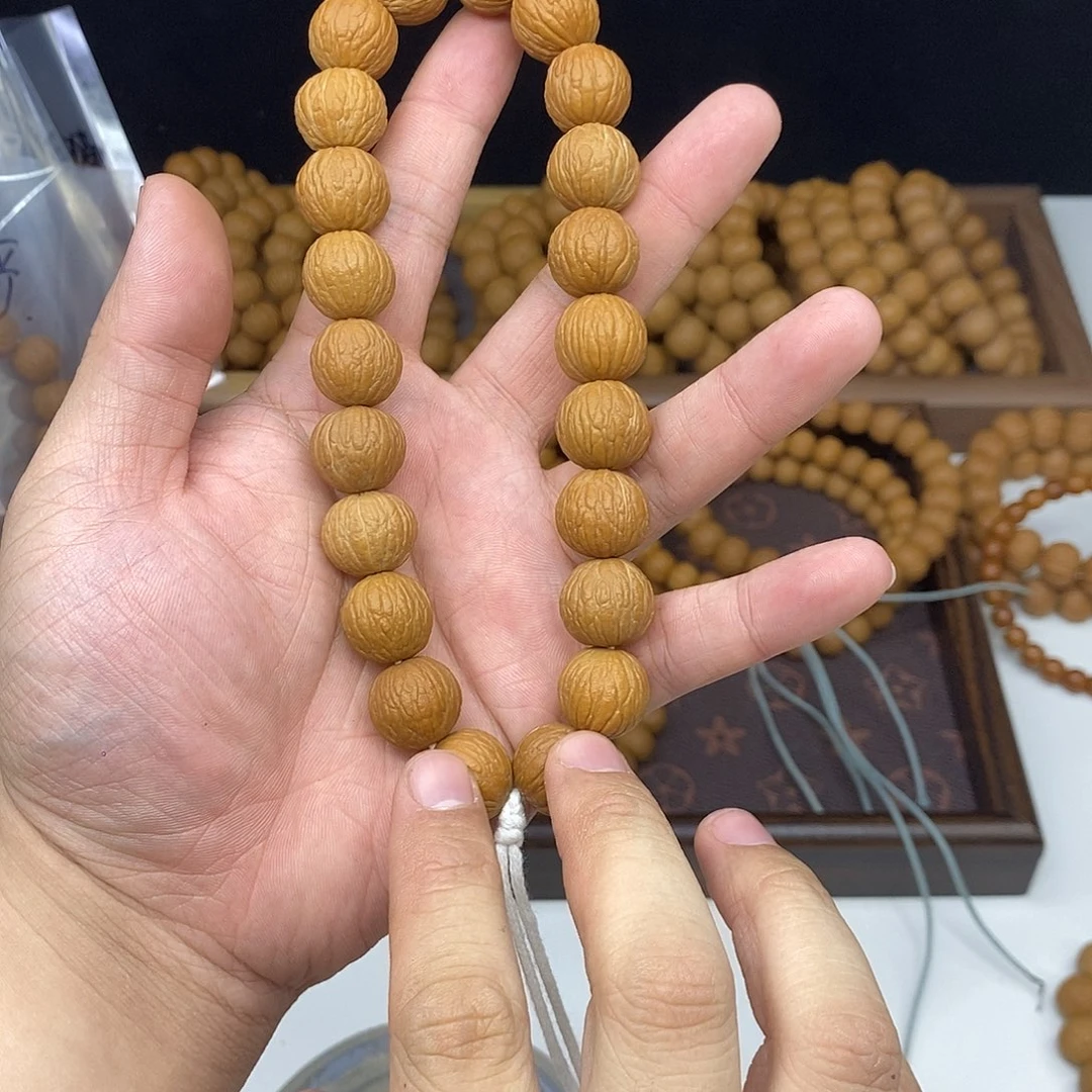 猴头核桃手串凤羽手持15+16+