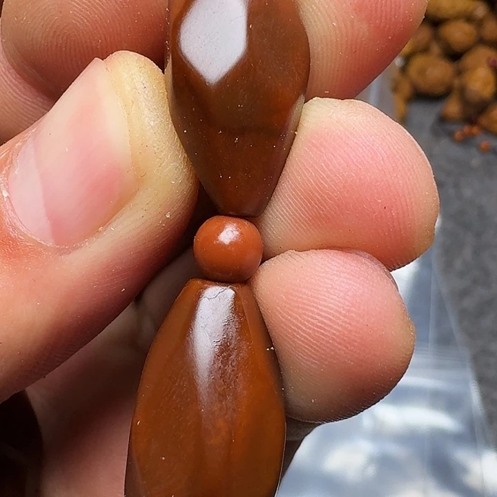 橄榄核手串你的电话