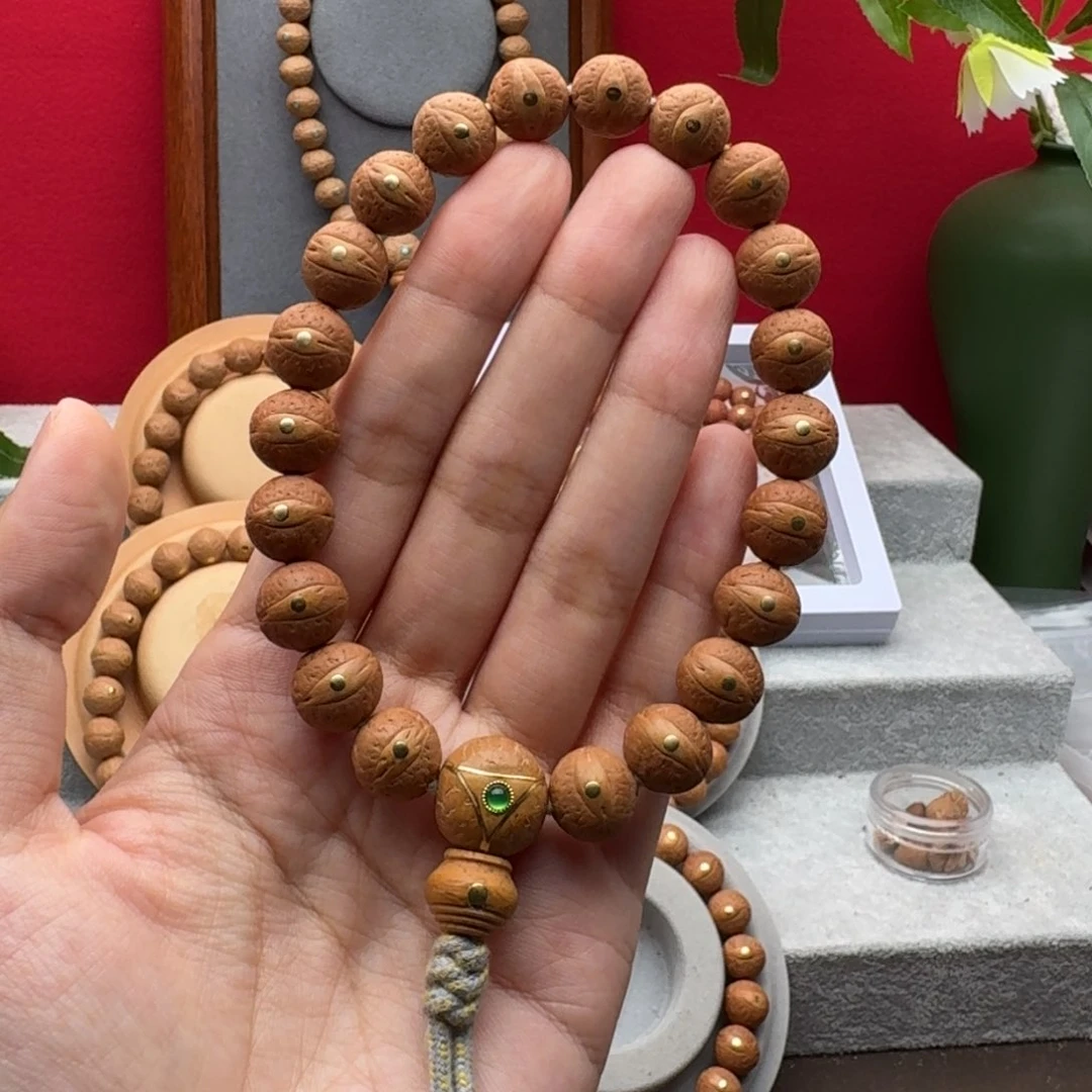 凤眼菩提手串11.4-12左右铜钉镶嵌手串