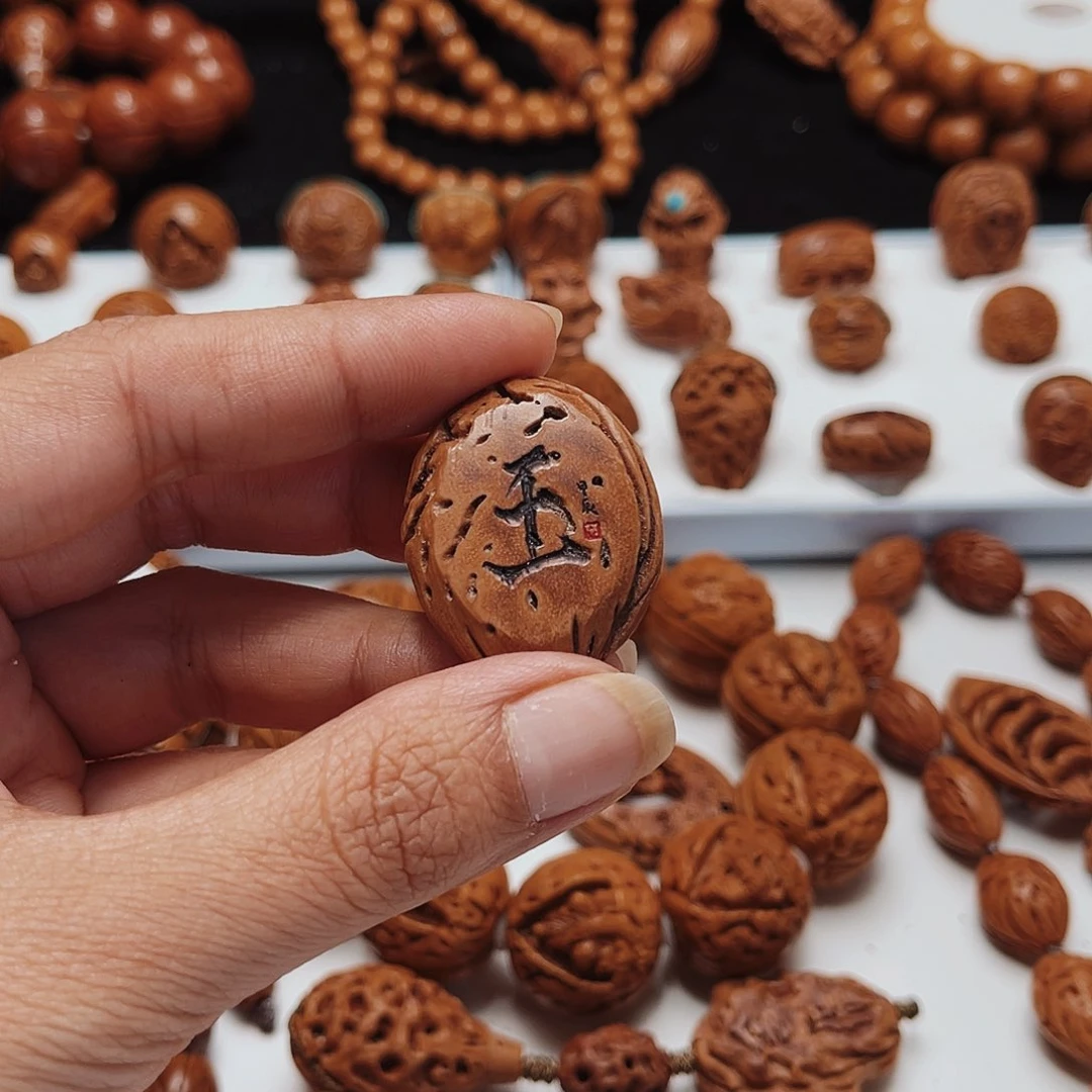 汤**鸟桃核手工制作工艺