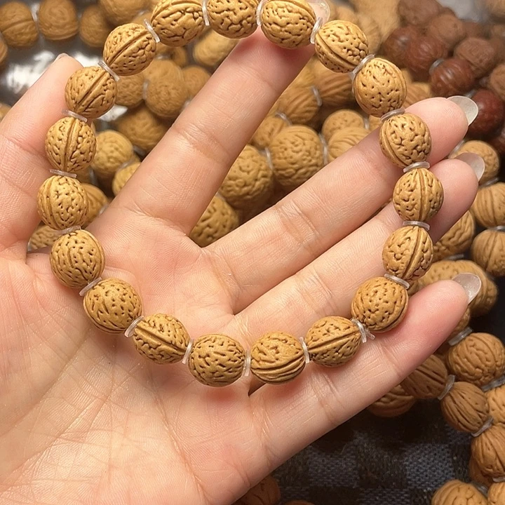 桃核手串打**间核桃手串11.5加