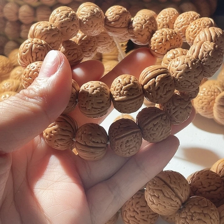 涅****吊坠桃核桃核手串金鱼肚69