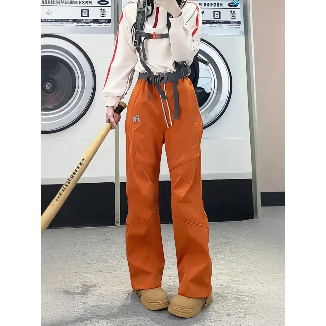 橘色多巴胺软壳冲锋裤男女秋季户外防水徒步登山裤美式伞兵休闲裤