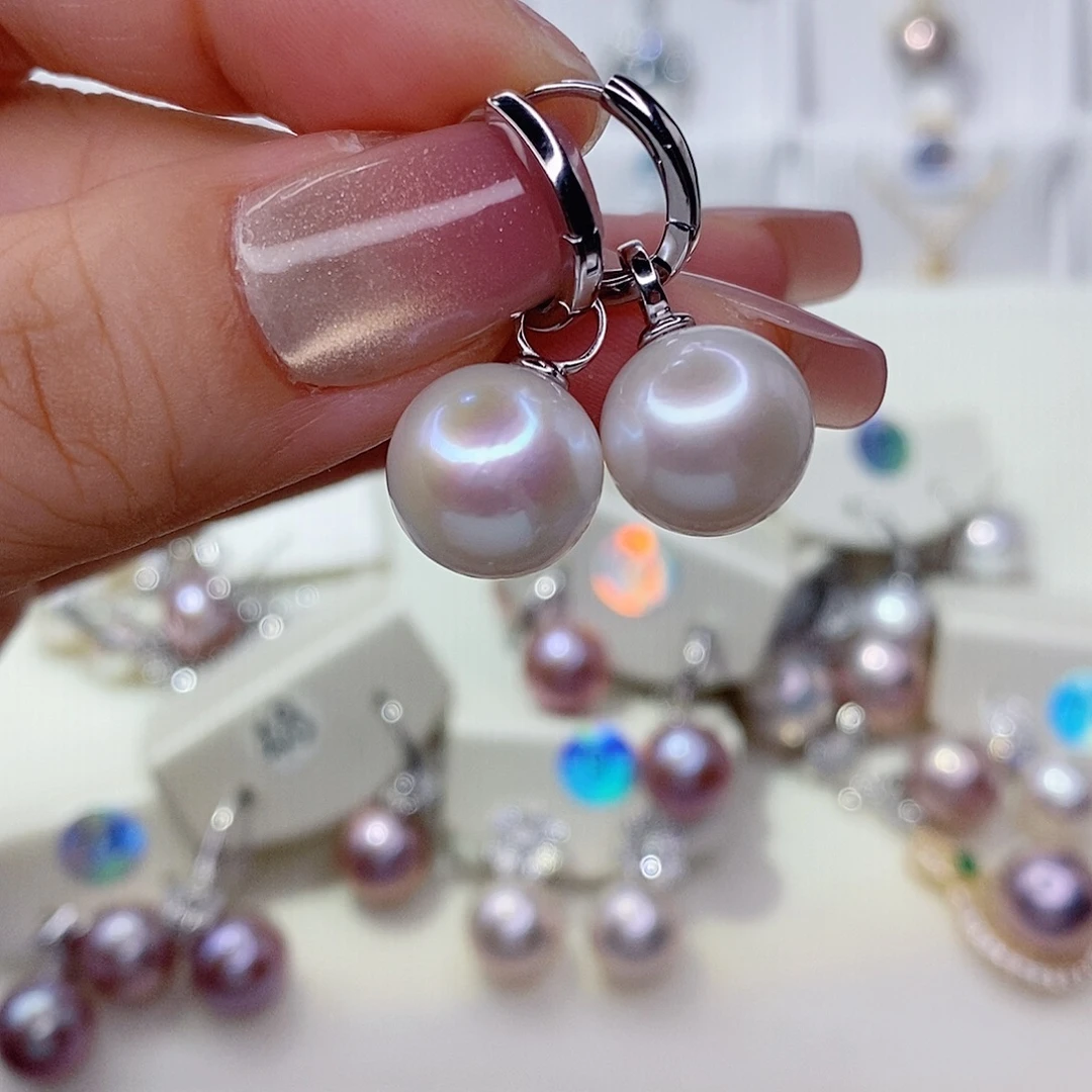 紫***开淡水珍珠银S925镶嵌耳饰