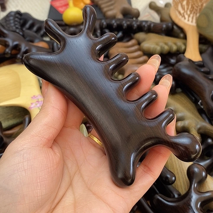 y***小紫光檀六合一按摩梳