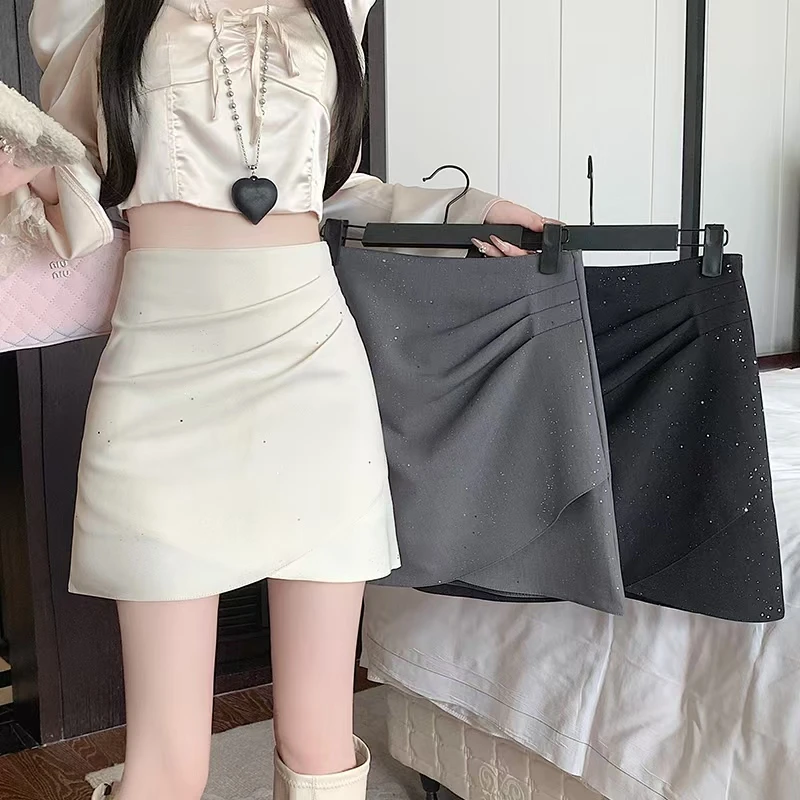 时尚亮片半身裙女春夏新款高腰显瘦气质百搭西装A字裙不规则设计
