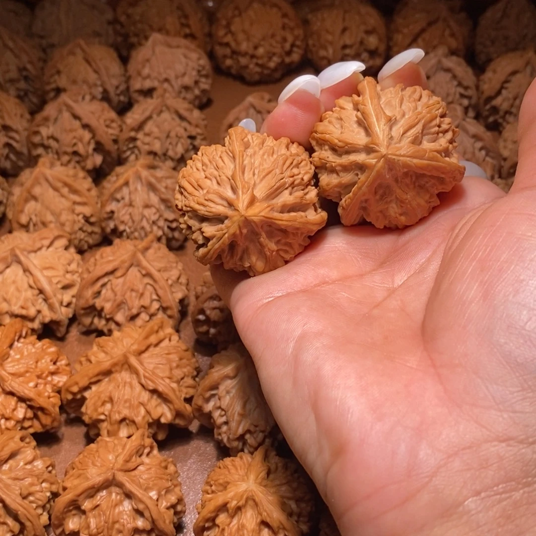 雾***.文山文玩核桃手把件